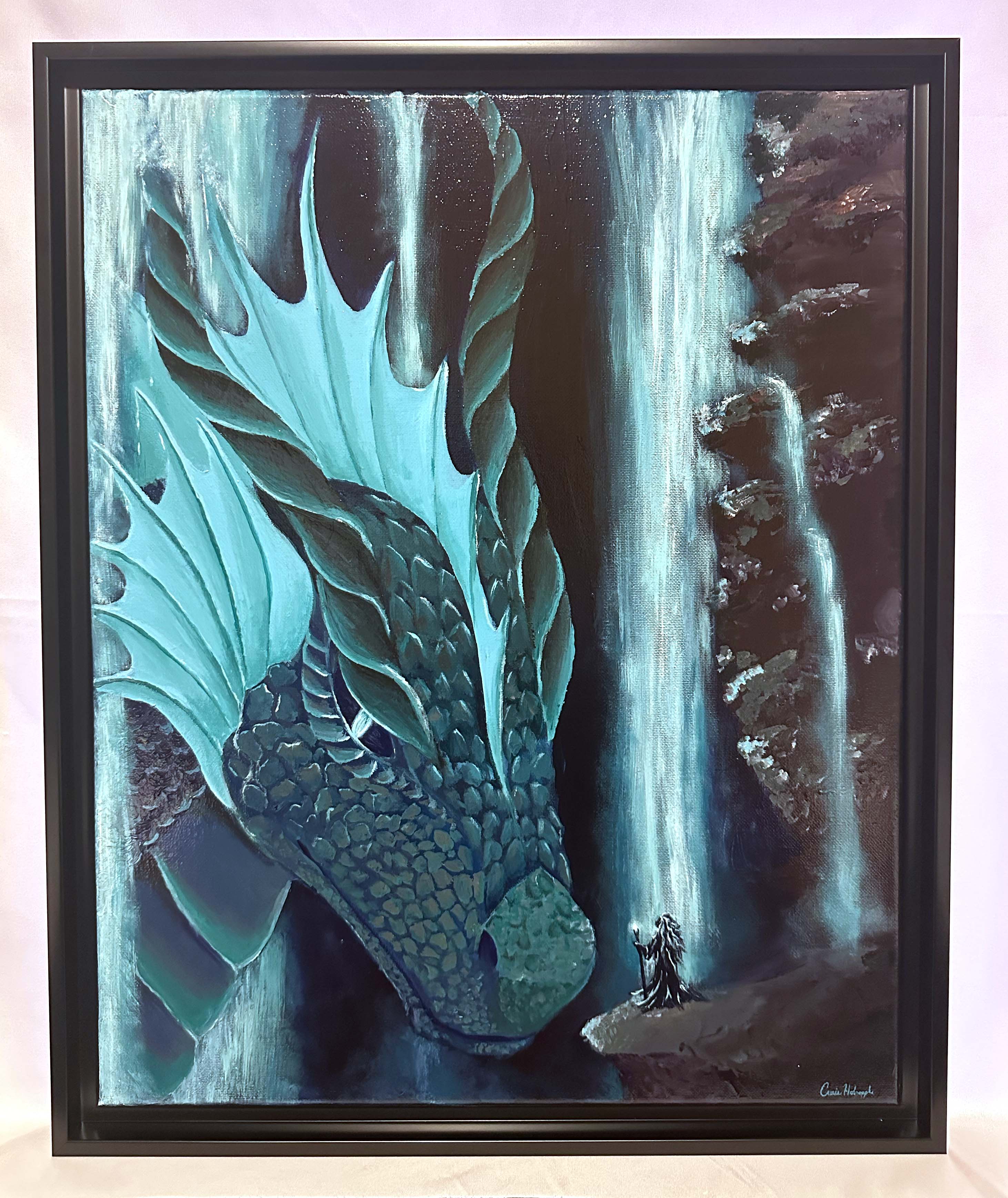 Blue dragon in front of a waterfall